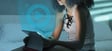 women streaming content on her tablet